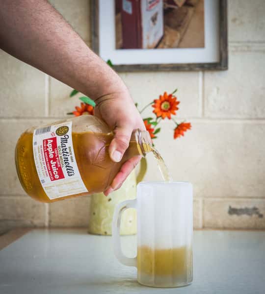 pouring frozen apple juice