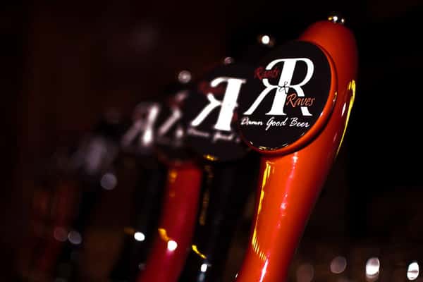 beer taps with restaurant logo