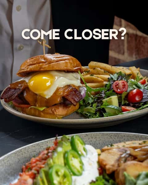 If you're going to stare you might as well come closer. 😘 🍔
And remember—Tuesday is Burger Night! Get $5 off burgers after 4 PM at participating locations. Dine-in only.