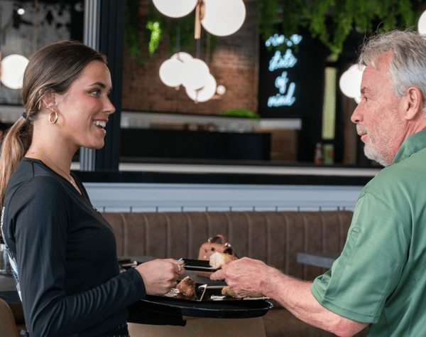 Employee interacting with a customer