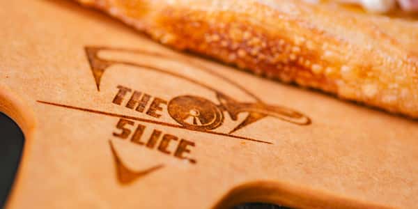 slice logo on wooden board