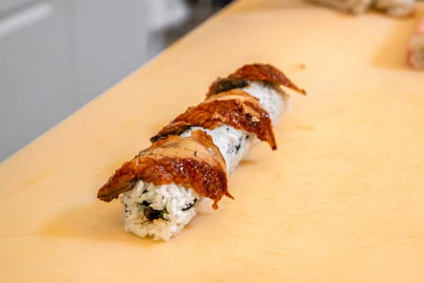eel sushi action shot