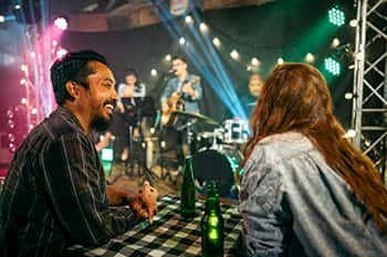 two people at a concert