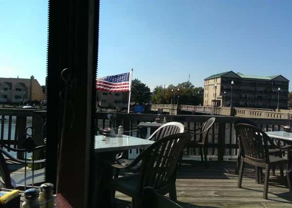 Outdoor shot of the restaurant's tables by Cambridge Creek
