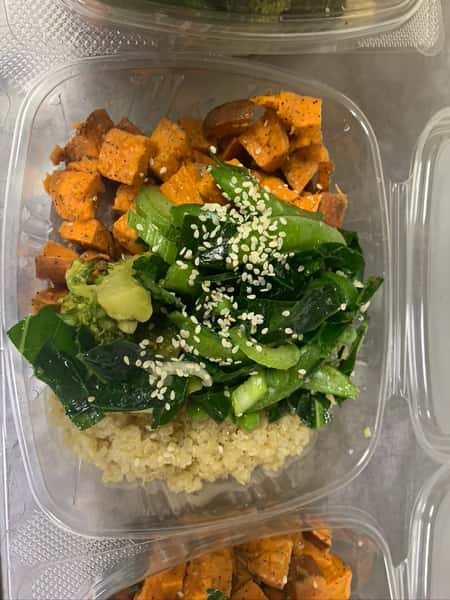 A sweet potato and quinoa salad topped with sesame seeds