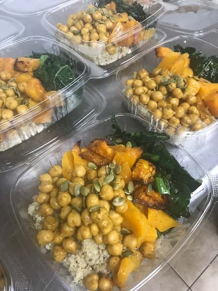 Chickpeas, sweet potatoes, and greens over quinoa