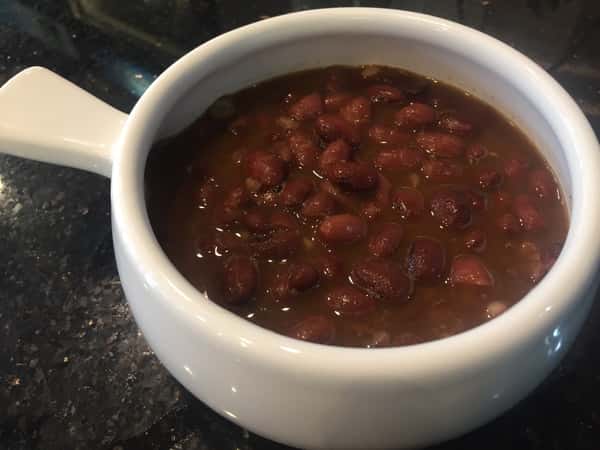 A bowl of baked vegetarian beans