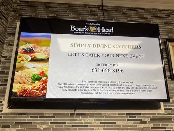 "Let us cater your next event" sign