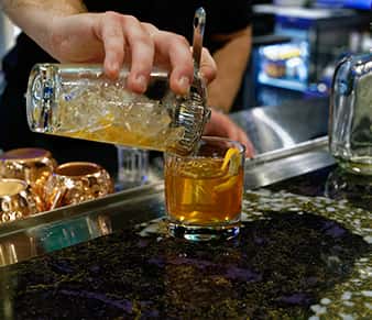 pouring cocktail