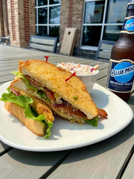 A sandwich on a plate.