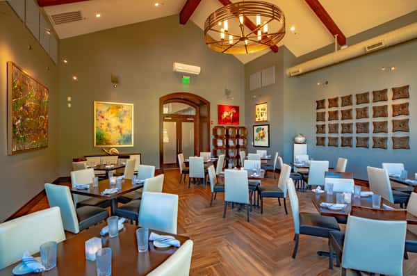 Upscale dining room at Dulivia Ristorante Italiano in Springdale, Utah, featuring elegant décor, warm lighting, and a refined atmosphere for date nights and special occasions.