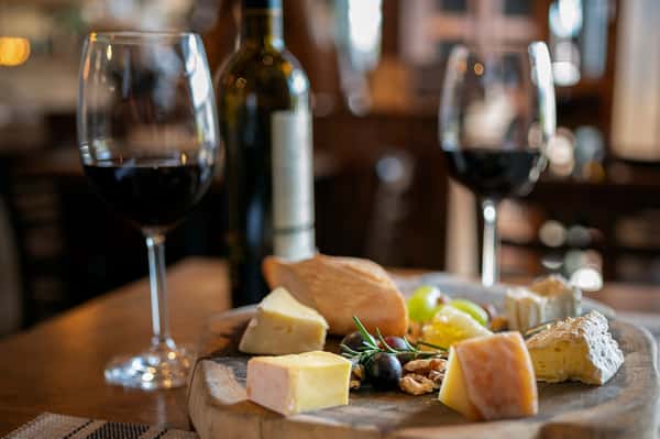 Wine glasses and a cheese plate