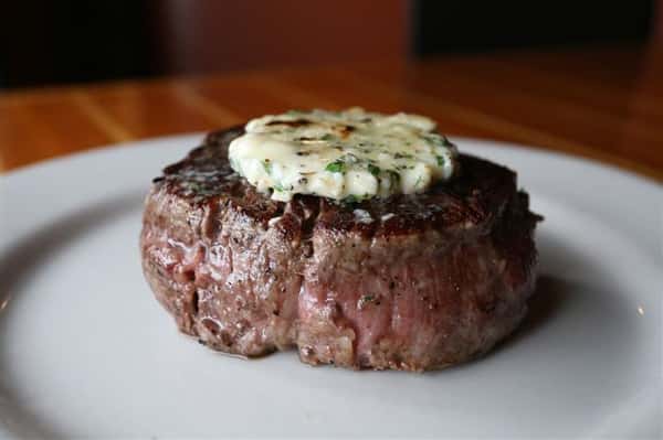 Filet Mignon - Aged 8oz Certified Angus Beef(r) charcoal grilled & topped with a housemade gorganzola compound butter