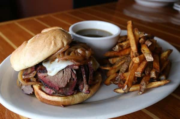 Brisket Sandwich - House smoked Certified Angus Beef(r) topped with horseradish cheddar & caramelized onions