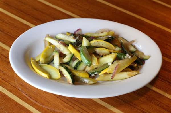 Mixed vegetables steamed on a plate.