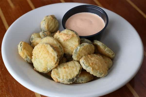 Fried Pickles - Served with a housemade sriracha ranch dipping sauce