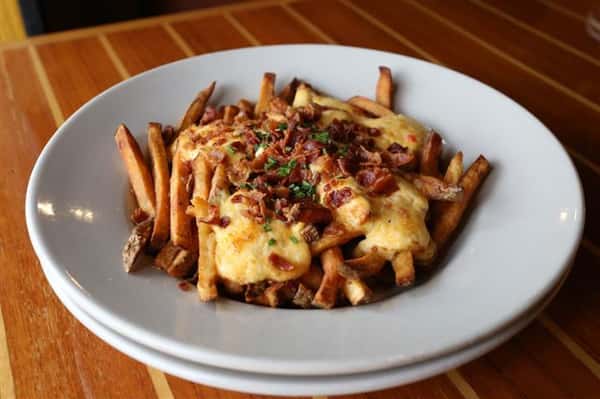 Pimento Cheese Fries - A twist on a southern classic using Grandma Smith's family recipe topped with bacon & fresh chives