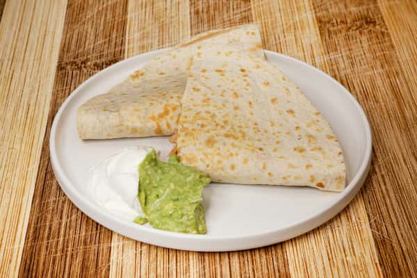 Flour tortilla grilled with Jack cheese folded in half