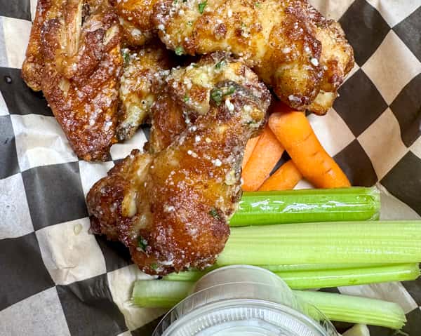 Crispy, saucy wingsāperfect with a cold craft beer! Bike Rack Brewing