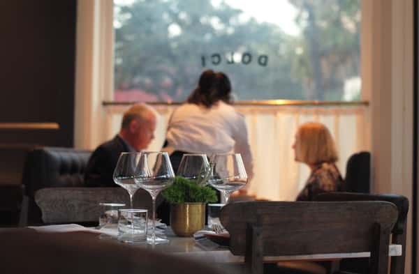 server bringing food to guests