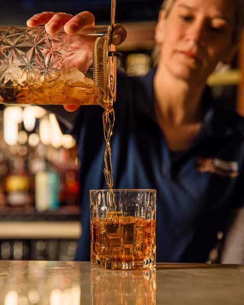 Hosel Rockets Golf and Whiskey Lounge Pouring Whiskey