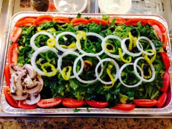 catering salad with onions, mushrooms, tomatoes, and lettuce