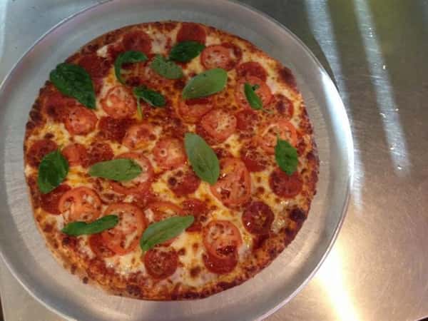 basil and tomato pizza pie