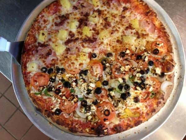 Half Hawaiian and Black olive pizza