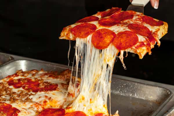 picking up pizza slice