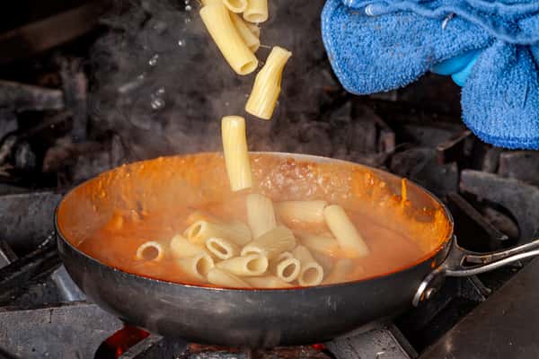 tossing pasta
