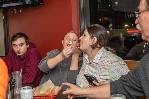 Friends sharing an appetizer