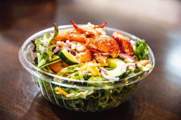 House salad topped with Lobster meat