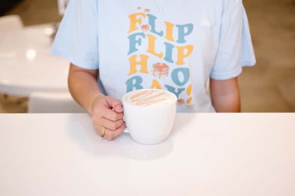 Coffee with whipped cream and design