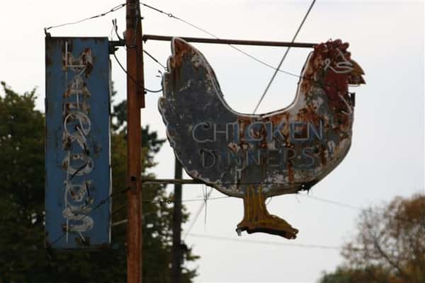 sign and chicken sign