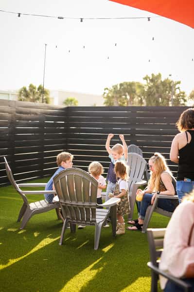 kids playing in outdoor courtyard area