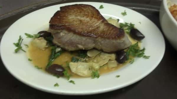 Entree with black olives, artichokes and mushrooms.