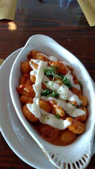 Gnocchi with marinara sauce and melted mozzarella cheese,