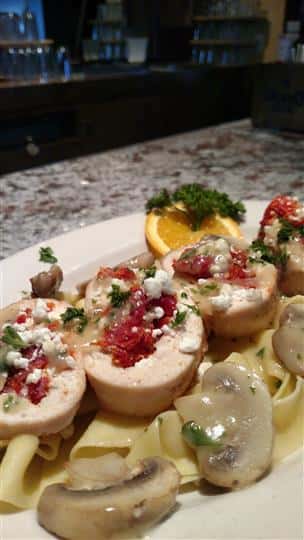Chicken with sundried tomato, mushroom and marsala sauce served over pasta.