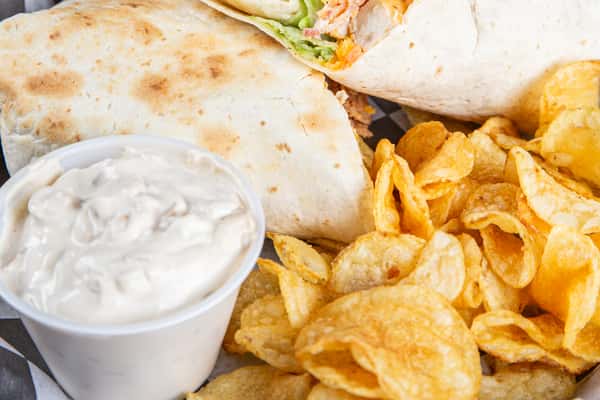Chicken bacon ranch wrap with kettle chips and ranch dipping sauce at Wisco Coffee Company