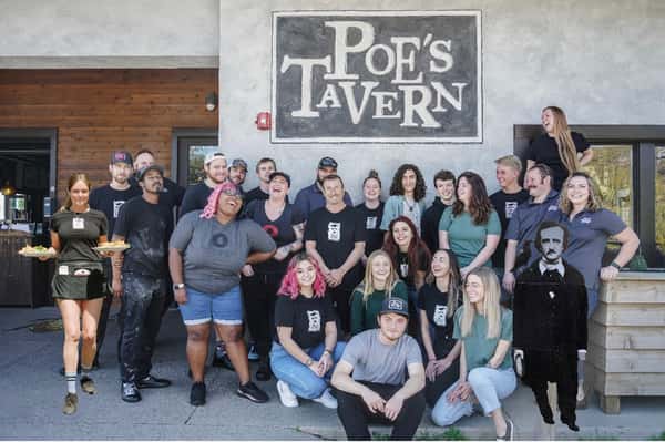Poe's employees in front of restaurant