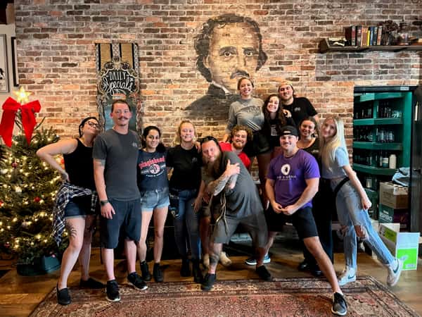 Poe's employees with Christmas tree