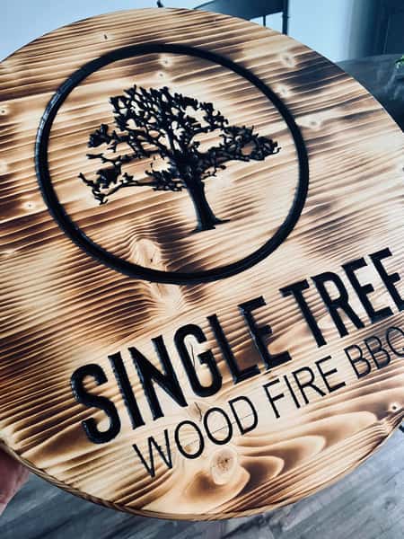 wood burned sign