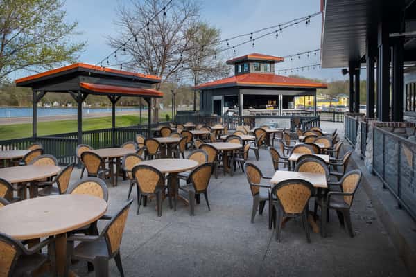 outdoor seating area with view of water