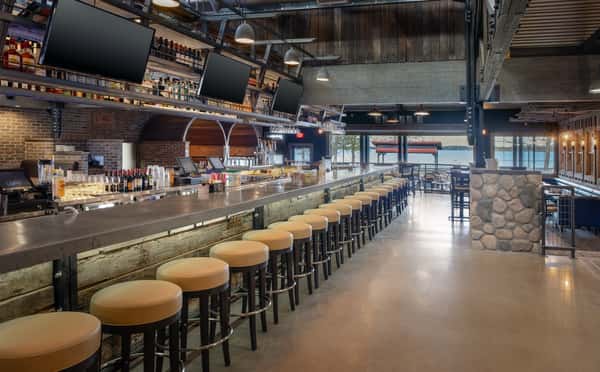 long bar with bar stools