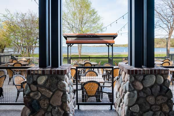 outdoor seating area with view of water