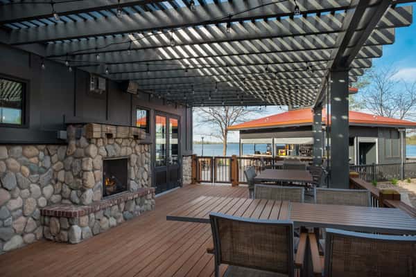 outdoor seating area beneath pergola