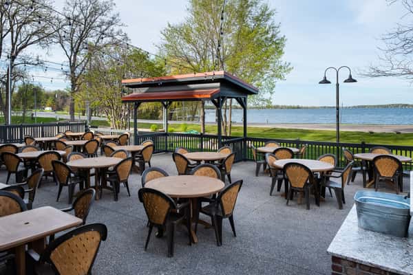 outdoor seating area with view of water