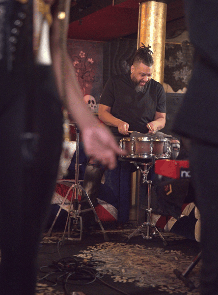 man playing the drums