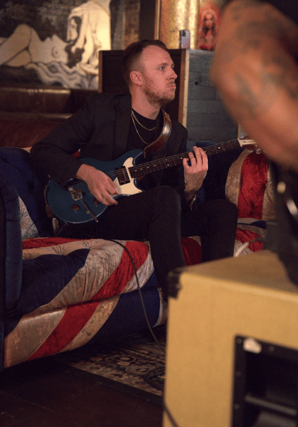 man playing guitar