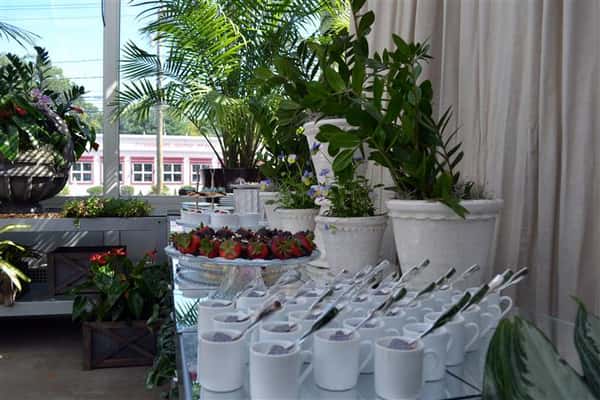 dessert items in cups with spoons